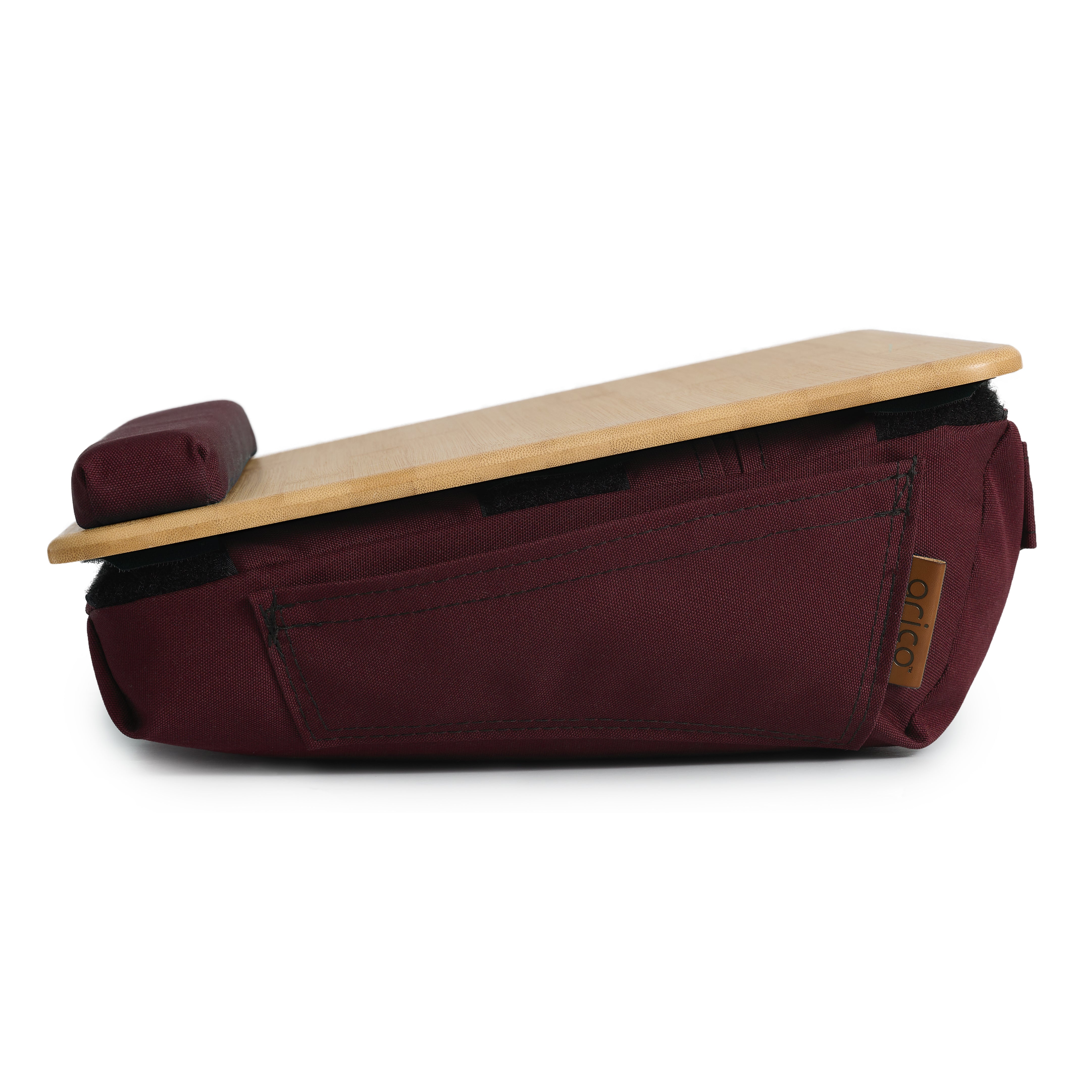 Vue latérale de la tablette ergonomique coussinée en bambou ARICO montrant son angle ergonomique