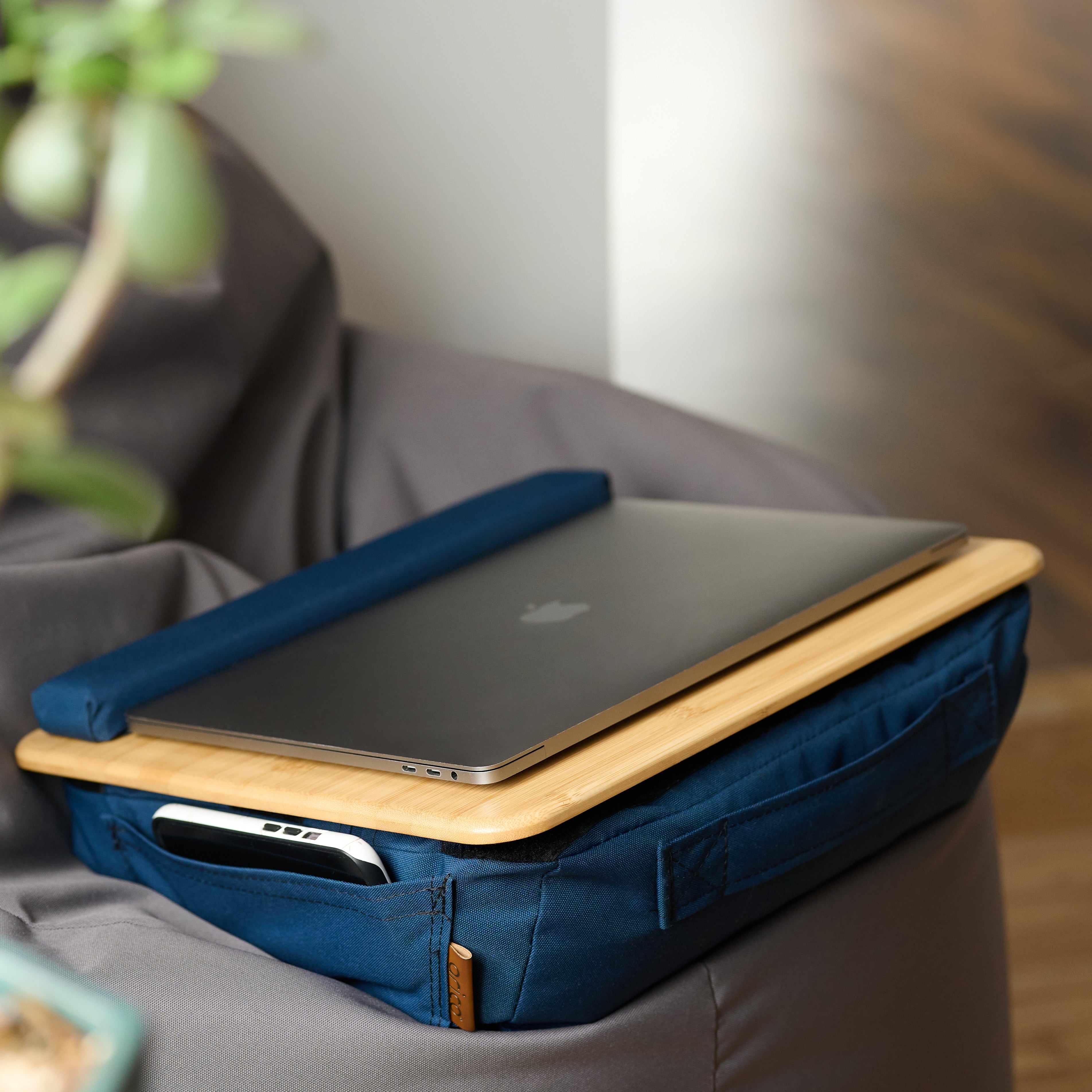 Rico charcoal colored cushion tray with Ipad. 
