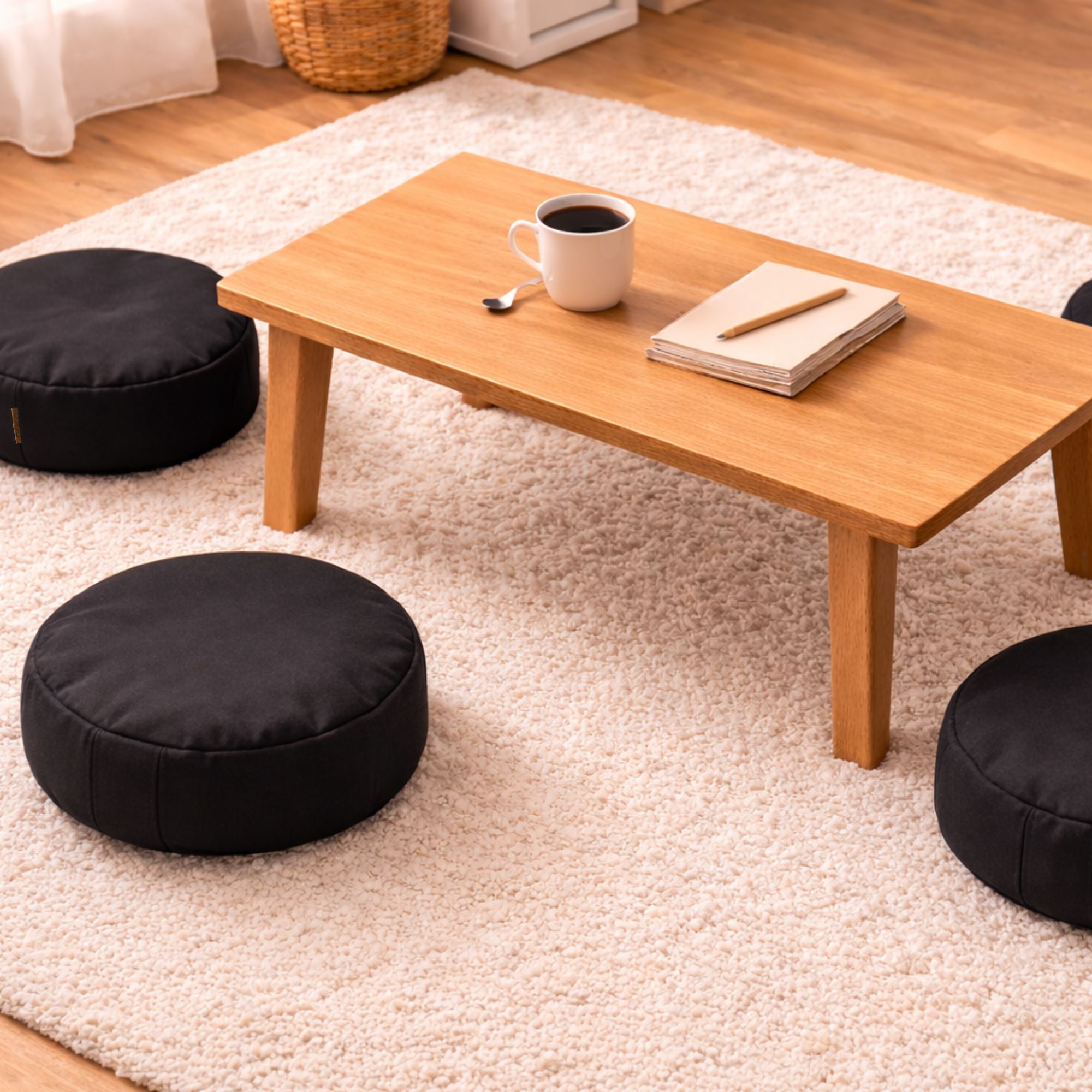ARICO floor cushions used around a coffee table in a living room. A comfortable and versatile seat for playing with children, sharing family time, reading, or meditating. Durable product made in Canada.