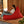 Load image into Gallery viewer, Bean Bag Junior XL de couleur Chili avec femme qui fait la lecture avec le plateau coussin RICO.
