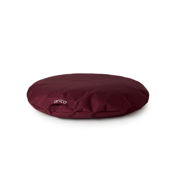 Coussin pour chien rond format standard de ARICO. Couleur bordeaux.