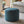 Load image into Gallery viewer, Pouf repose-pieds Arico de couleur récif dans un décor maison. 
